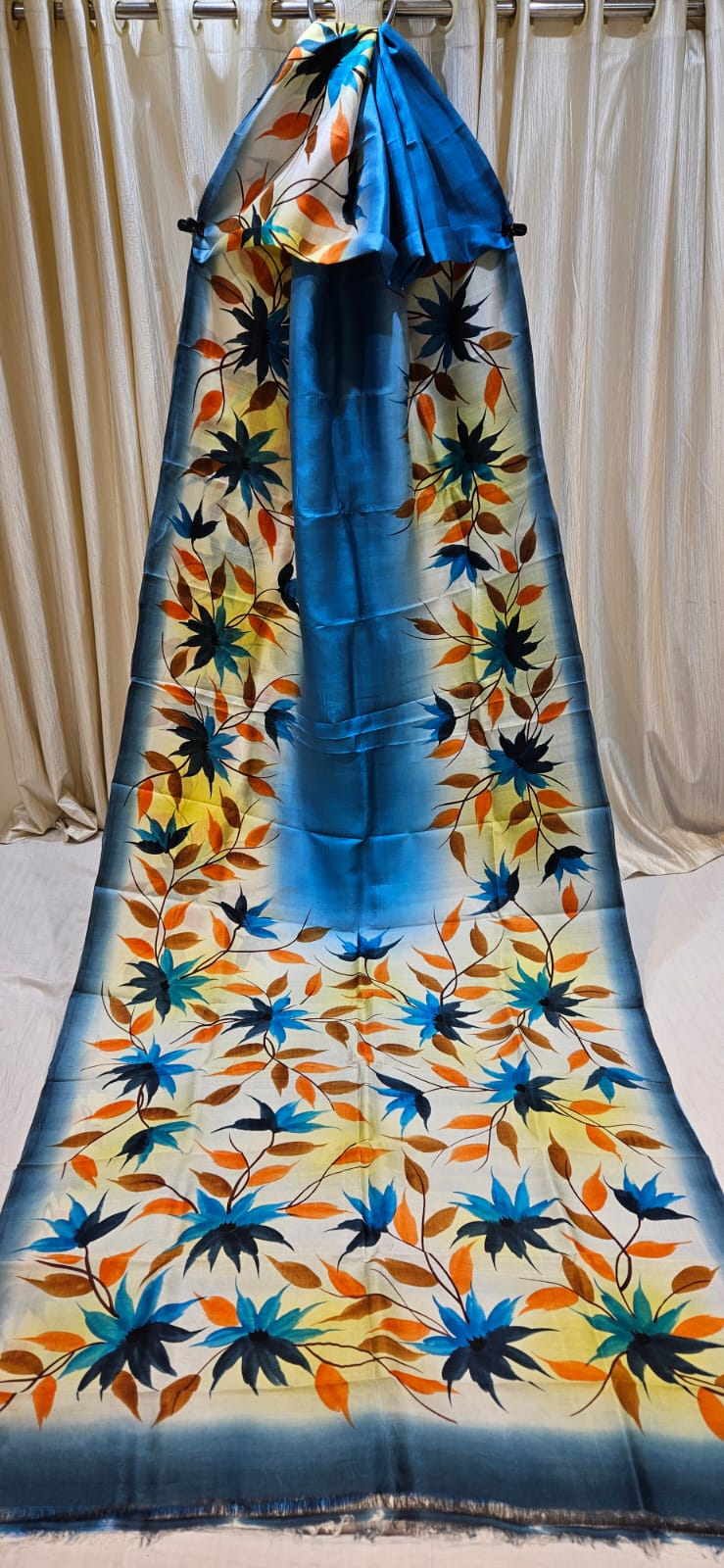 Pure Katan silk blue saree with hand-painted floral design, premium soft silk festive and wedding wear saree